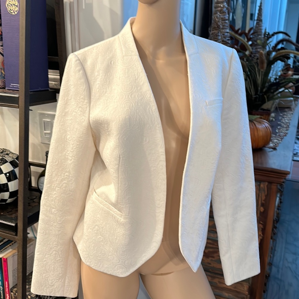 Limited cream women’s tuxedo jacket. Sz m.